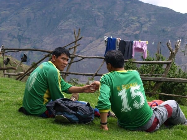 Sharing a glass of chicha in the mountains of Cusco, Peru - Matthew Barker